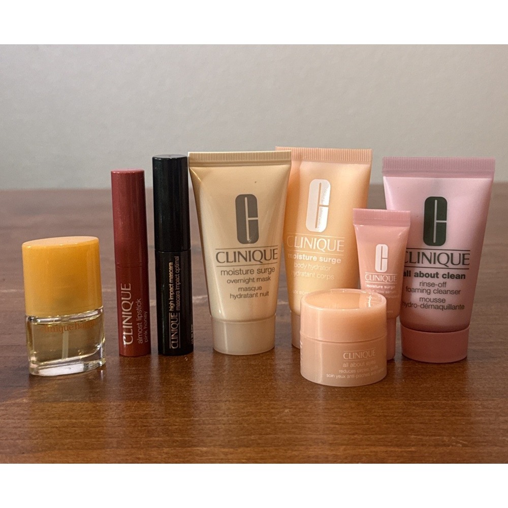 CLINIQUE 8 Piece Travel Set Moisturizing Lotion Surge Mascara Lipstick Happy